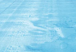 BACHE A BULLES PISCINE BOIS LOUISIANA 400µ BLEU BORDEE 4 COTES